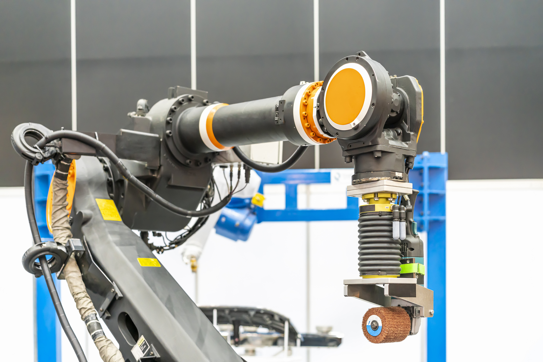 A Cost-Effective Path to Better Finishing: Robots That Learn Through Sound